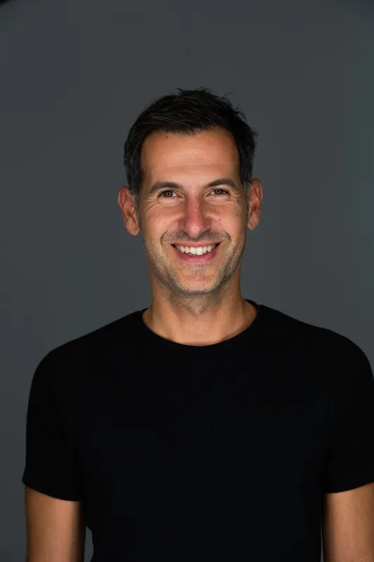 a portrait of a male therapist