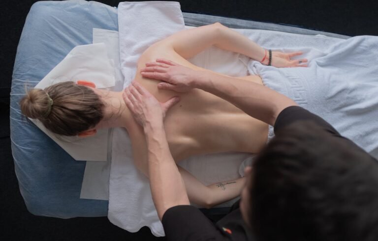 young woman receiving massage therapy